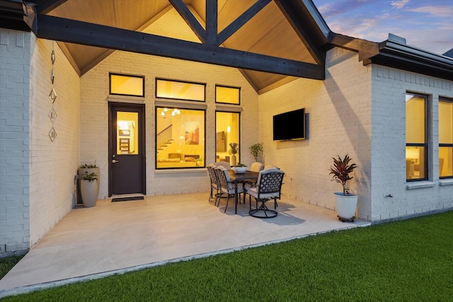 631 Rita Blanca Dr, Webster, TX 77598 - patio terrace at dusk featuring a patio area