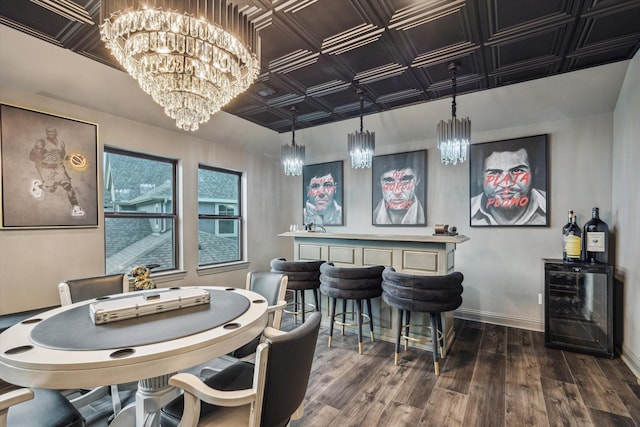631 Rita Blanca Dr, Webster, TX 77598 - dining room featuring wine cooler, a chandelier, an ornate ceiling, and wood finished floors