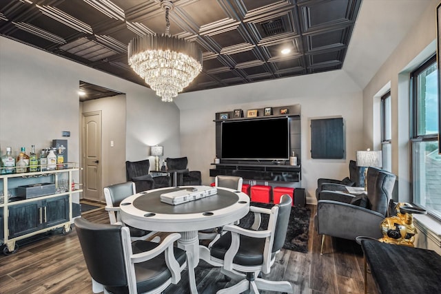 631 Rita Blanca Dr, Webster, TX 77598 - dining space with an ornate ceiling, a chandelier, and dark wood-style floors
