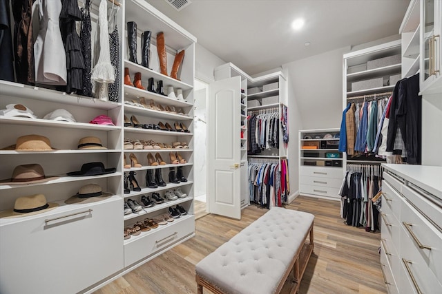 631 Rita Blanca Dr, Webster, TX 77598 - walk in closet featuring light wood-type flooring