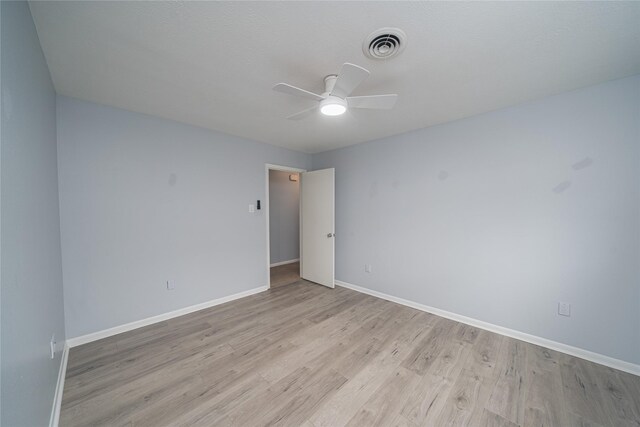 7602 Jackwood St, Houston, TX 77074 - empty room featuring a ceiling fan and light wood-style flooring