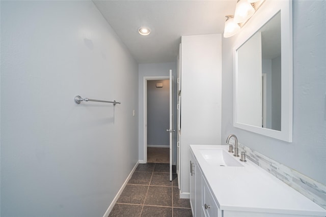 7602 Jackwood St, Houston, TX 77074 - bathroom with vanity, tile patterned floors, and recessed lighting