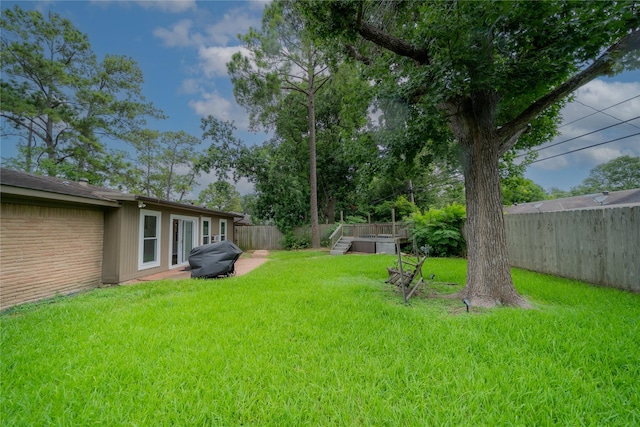 7602 Jackwood St, Houston, TX 77074 - fenced backyard featuring a wooden deck