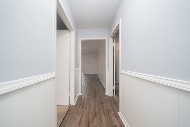 7602 Jackwood St, Houston, TX 77074 - hallway featuring wood finished floors and wainscoting