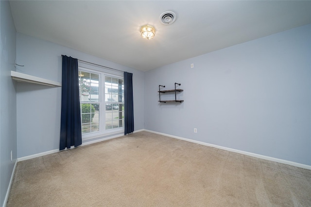 7602 Jackwood St, Houston, TX 77074 - carpeted spare room featuring baseboards