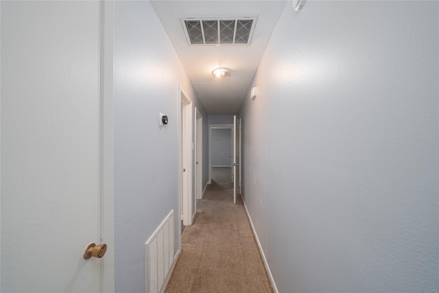 7602 Jackwood St, Houston, TX 77074 - hall featuring light carpet and baseboards