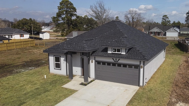 175 Deep Woods Ln, Livingston, TX 77351 - view of front of house featuring a shingled roof, concrete driveway, a residential view, and an attached garage