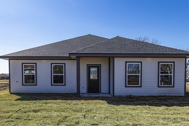 175 Deep Woods Ln, Livingston, TX 77351 - view of front of home with a shingled roof and a front yard
