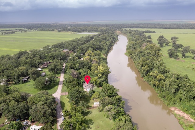 703 Pecan Valley Dr, Wharton, TX 77488 - aerial view of sparsely populated area with a large body of water and a tree filled landscape