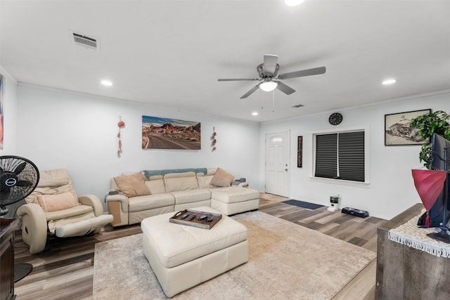 703 Pecan Valley Dr, Wharton, TX 77488 - living area featuring wood finished floors, ornamental molding, a ceiling fan, and recessed lighting