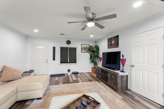 703 Pecan Valley Dr, Wharton, TX 77488 - living area featuring ornamental molding, wood finished floors, recessed lighting, and ceiling fan