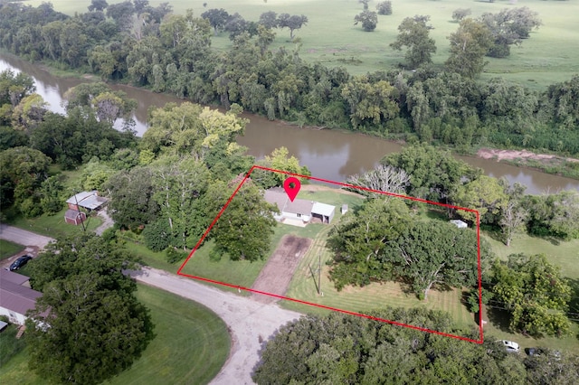 703 Pecan Valley Dr, Wharton, TX 77488 - aerial view of property's location featuring a nearby body of water and property parcel outlined