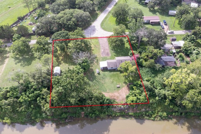 703 Pecan Valley Dr, Wharton, TX 77488 - aerial view of property and surrounding area featuring property boundaries highlighted