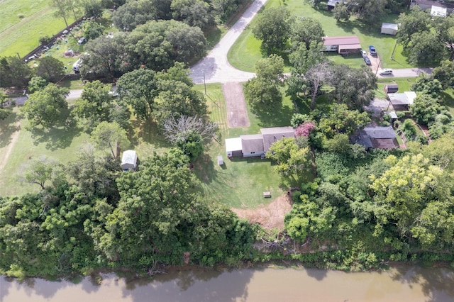 703 Pecan Valley Dr, Wharton, TX 77488 - aerial view of property and surrounding area with a tree filled landscape