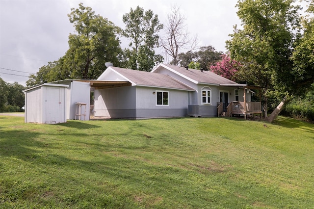 703 Pecan Valley Dr, Wharton, TX 77488 - back of property with a wooden deck, a lawn, and a shingled roof