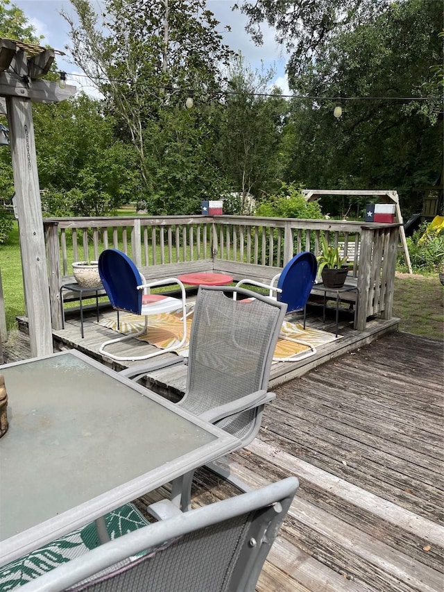 507 Oak Dr, Lake Jackson, TX 77566 - wooden terrace featuring view of scattered trees