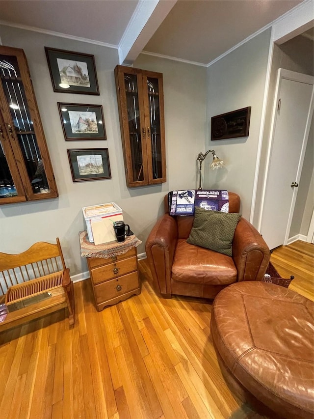 507 Oak Dr, Lake Jackson, TX 77566 - sitting room featuring crown molding and light wood finished floors