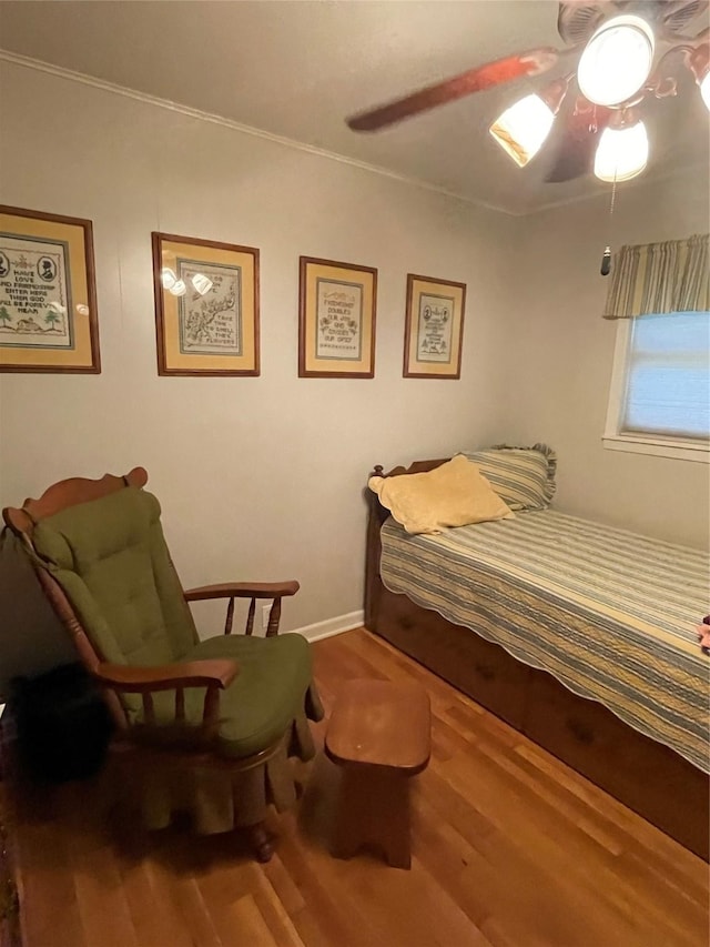 507 Oak Dr, Lake Jackson, TX 77566 - bedroom featuring wood finished floors and ceiling fan