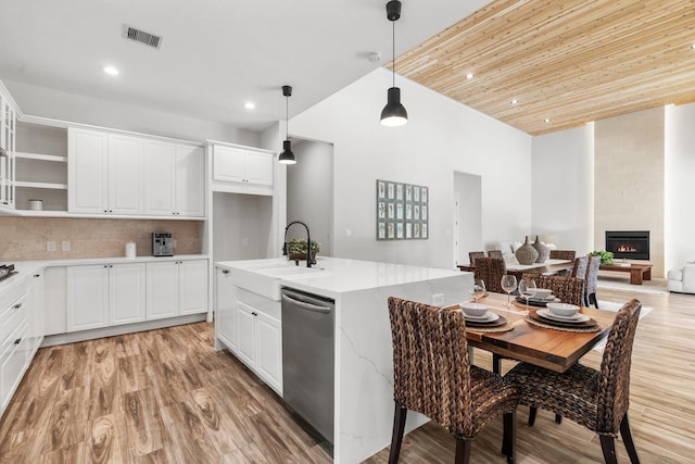 25203 Elijah Ct, Tomball, TX 77375 - kitchen with dishwasher, white cabinets, tasteful backsplash, decorative light fixtures, and wood ceiling