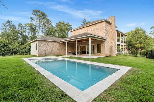 25203 Elijah Ct, Tomball, TX 77375 - back of house with a patio, a chimney, brick siding, and a balcony