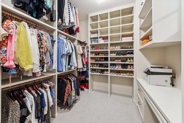 2207 Dunraven Ln, Houston, TX 77019 - walk in closet featuring carpet flooring