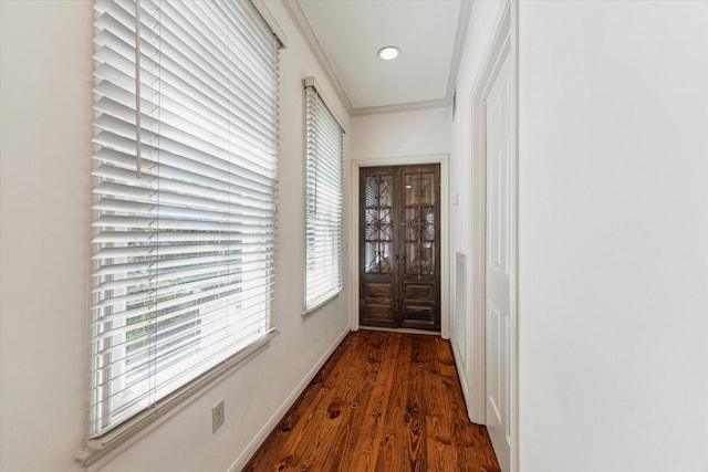 2207 Dunraven Ln, Houston, TX 77019 - entryway with healthy amount of natural light, wood finished floors, and crown molding