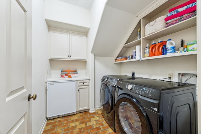 2207 Dunraven Ln, Houston, TX 77019 - laundry room featuring washer and dryer and baseboards