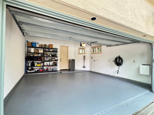 2207 Dunraven Ln, Houston, TX 77019 - garage with baseboards