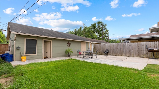 3409 Michigan St, Baytown, TX 77520 - rear view of property featuring a patio and a fenced backyard