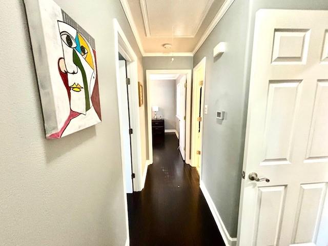 9618 Chatfield St, Houston, TX 77025 - hallway featuring attic access, crown molding, and dark wood finished floors