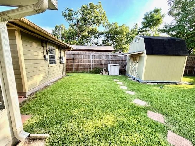 9618 Chatfield St, Houston, TX 77025 - fenced backyard featuring a storage unit