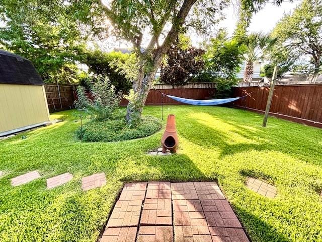 9618 Chatfield St, Houston, TX 77025 - fenced backyard with a shed