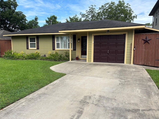 9618 Chatfield St, Houston, TX 77025 - ranch-style home featuring a front yard, concrete driveway, and an attached garage