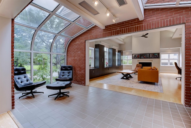 3211 Pittsburg St, West University Place, TX 77005 - sunroom with healthy amount of natural light and track lighting