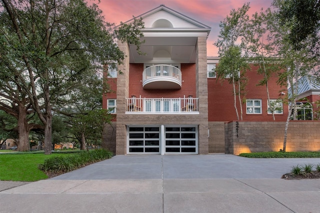 3211 Pittsburg St, West University Place, TX 77005 - view of property featuring driveway and a garage