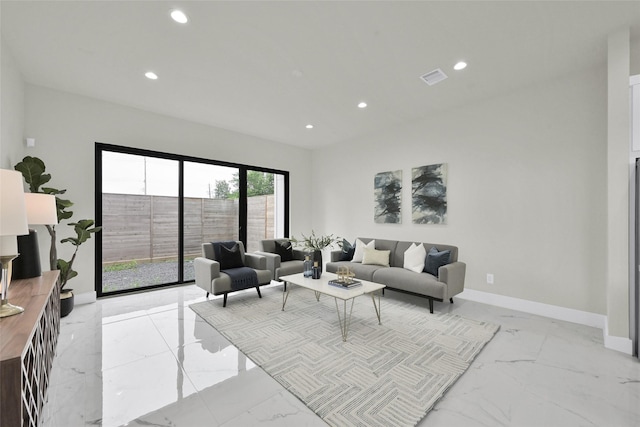 2808 Cary St Unit B, Houston, TX 77003 - living room with light marble finish floors and recessed lighting
