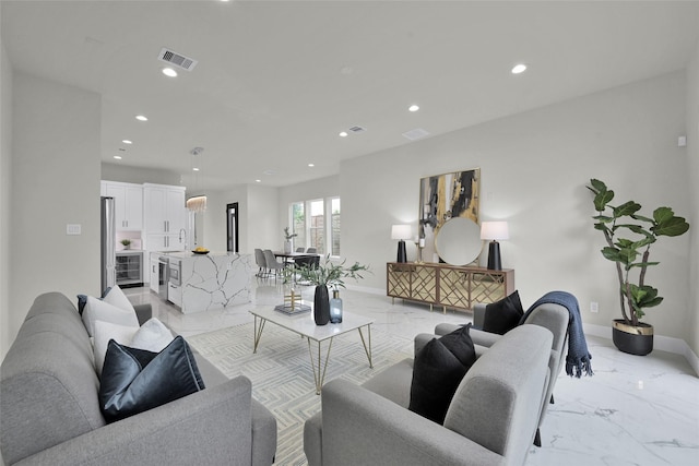 2808 Cary St Unit B, Houston, TX 77003 - living area with light marble finish floors and recessed lighting