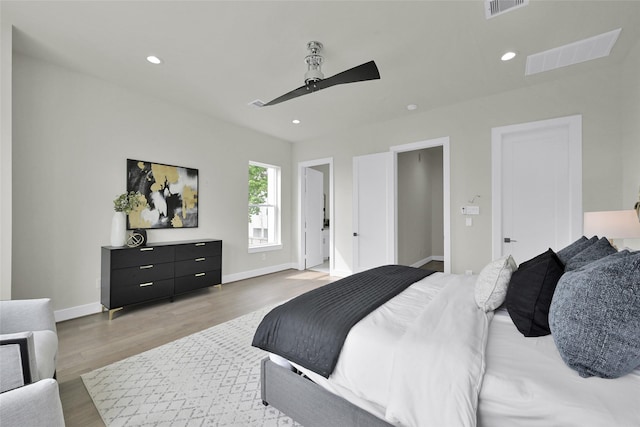 2808 Cary St Unit B, Houston, TX 77003 - bedroom featuring light wood-type flooring, a ceiling fan, and recessed lighting