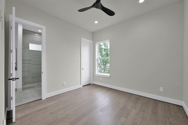 2808 Cary St Unit B, Houston, TX 77003 - spare room featuring recessed lighting, a ceiling fan, and wood finished floors