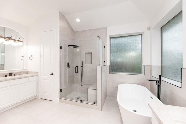19507 Gladewater Ct, Cypress, TX 77433 - full bath with vanity, a soaking tub, a shower stall, plenty of natural light, and lofted ceiling