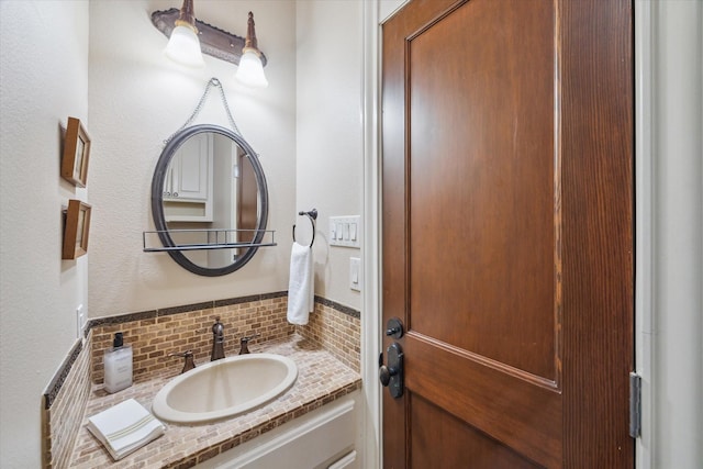 1002 Cowards Creek Ct, Friendswood, TX 77546 - bathroom with decorative backsplash and vanity