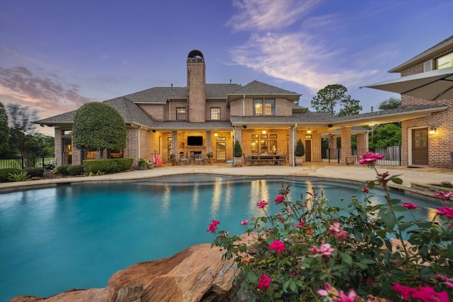 1002 Cowards Creek Ct, Friendswood, TX 77546 - outdoor pool featuring a patio