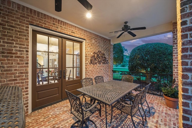 1002 Cowards Creek Ct, Friendswood, TX 77546 - view of patio featuring french doors, a ceiling fan, and outdoor dining space