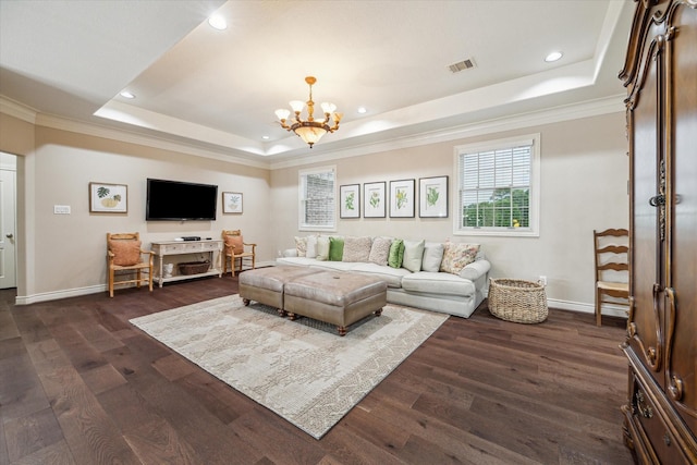 1002 Cowards Creek Ct, Friendswood, TX 77546 - living room featuring a raised ceiling, a chandelier, recessed lighting, crown molding, and dark wood finished floors