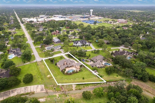 1002 Cowards Creek Ct, Friendswood, TX 77546 - aerial view of property's location featuring property boundaries highlighted and nearby suburban area