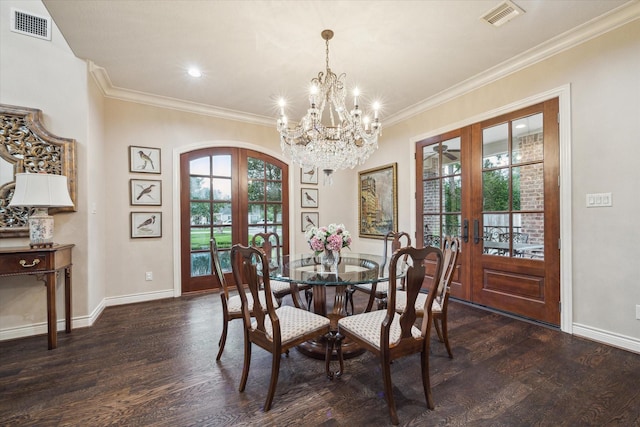 1002 Cowards Creek Ct, Friendswood, TX 77546 - dining space with french doors, dark wood finished floors, a chandelier, and ornamental molding