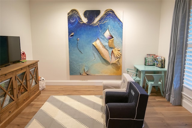 7611 Fairdale Ln, Houston, TX 77063 - living area featuring wood finished floors and baseboards
