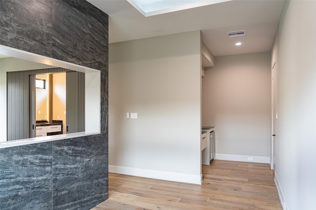 2222 Branard St, Houston, TX 77098 - bar featuring wood finished floors and recessed lighting
