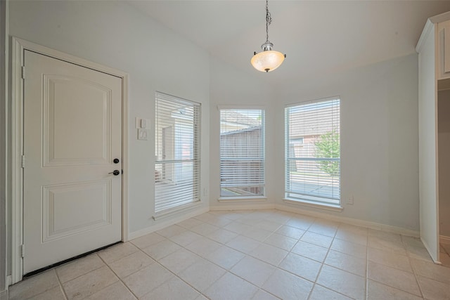 11607 Buck Springs Trl, Tomball, TX 77377 - entrance foyer featuring vaulted ceiling and light tile patterned flooring