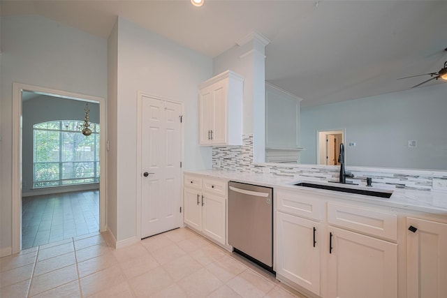 11607 Buck Springs Trl, Tomball, TX 77377 - kitchen featuring stainless steel dishwasher, decorative backsplash, white cabinetry, and ceiling fan